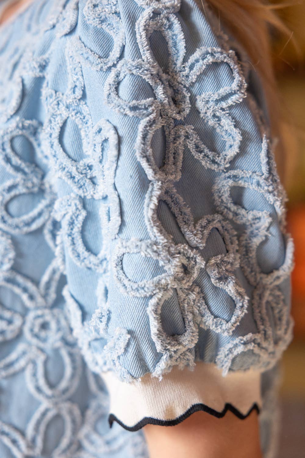 36086 Wave Ribbed Trim Detail Floral Textured Denim Top