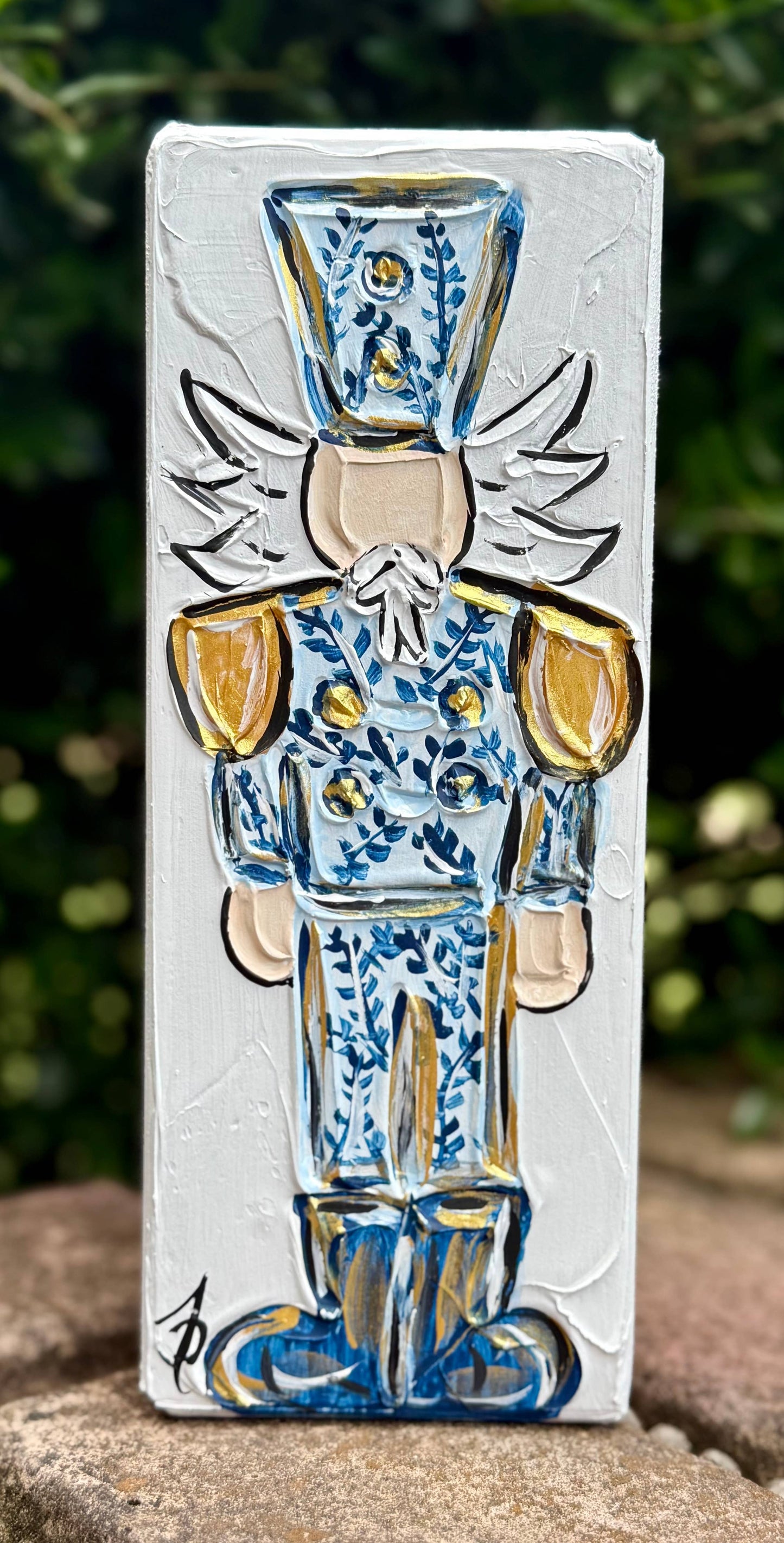 Chinoiserie style nutcracker on wood block grand millennial 