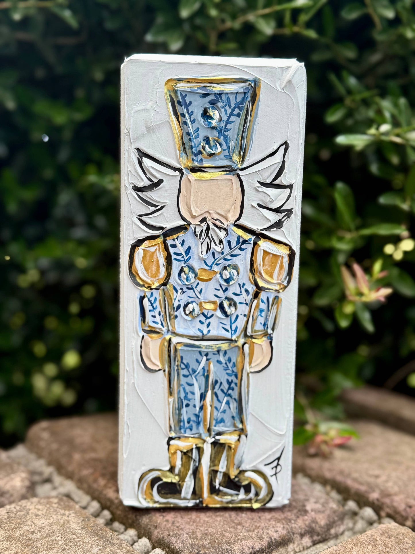 Chinoiserie style nutcracker on wood block grand millennial 