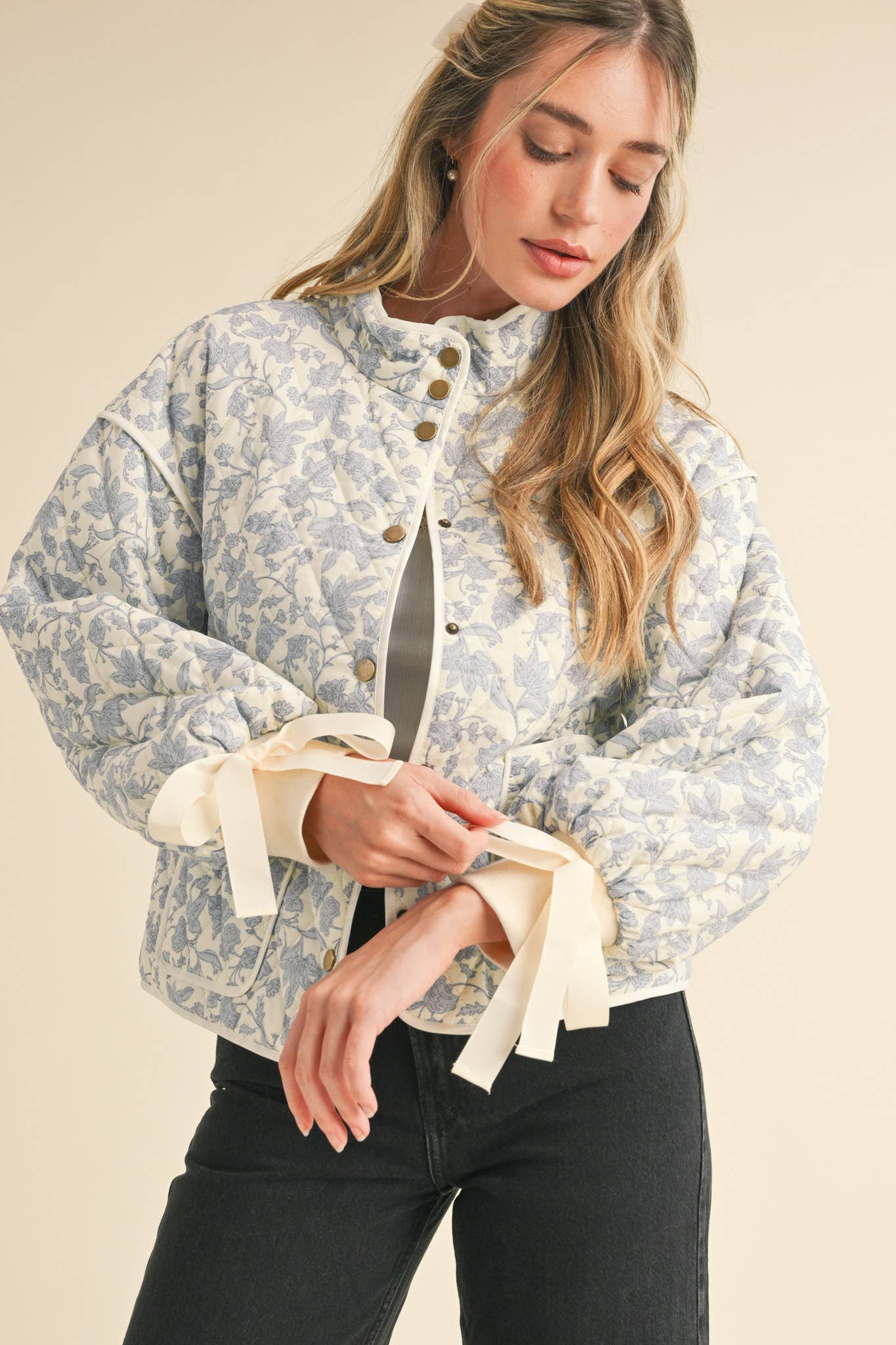 FLORAL QUILTED JACKET WITH RIBBON DETAIL MJK3622